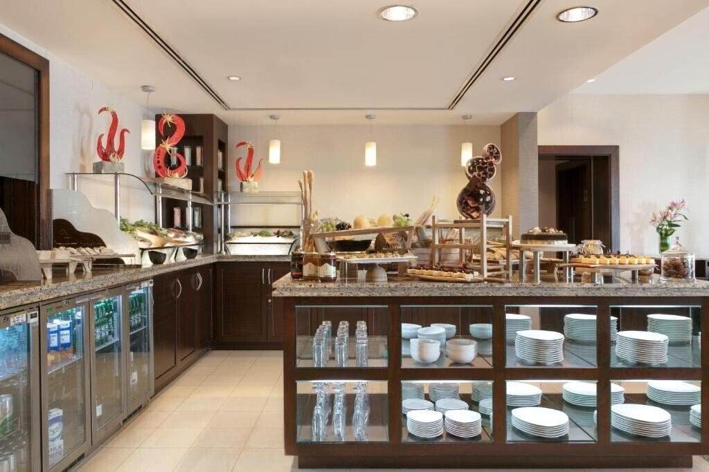 Фотография Traders Hotel Qaryat Al Beri 4*