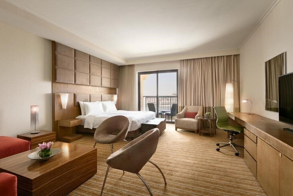 Изображение Traders Hotel Qaryat Al Beri 4*
