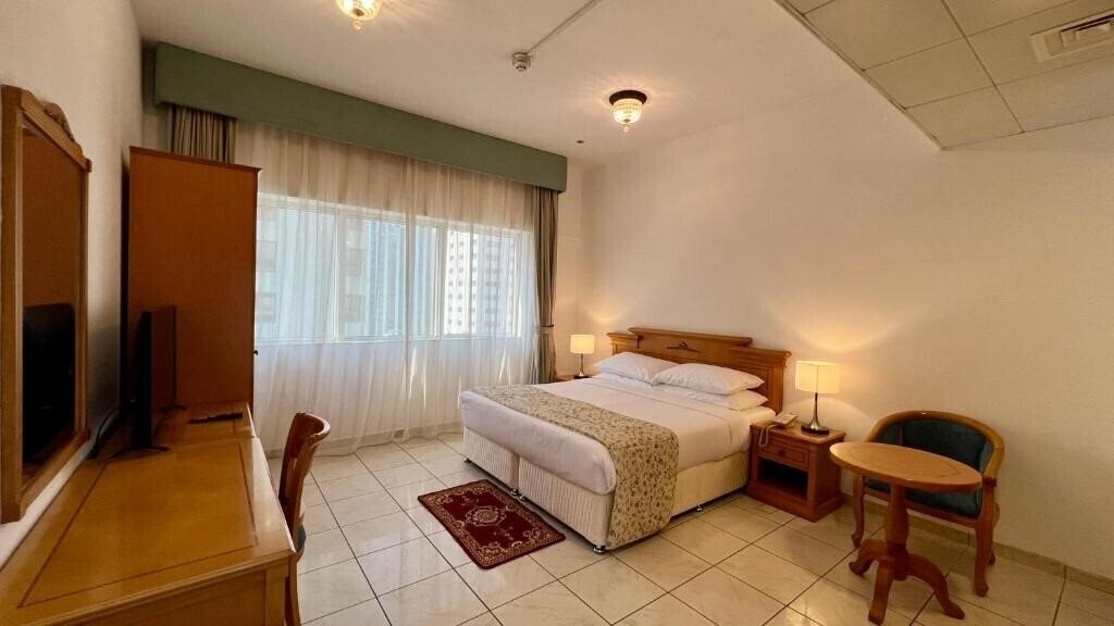 Отель The Uptown Apartments Abu Dhabi 4*