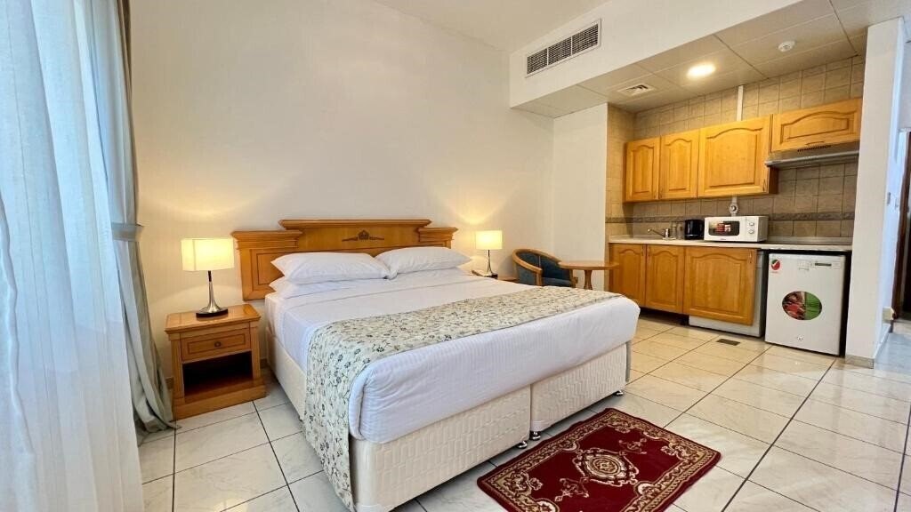 Фото The Uptown Apartments Abu Dhabi 4*