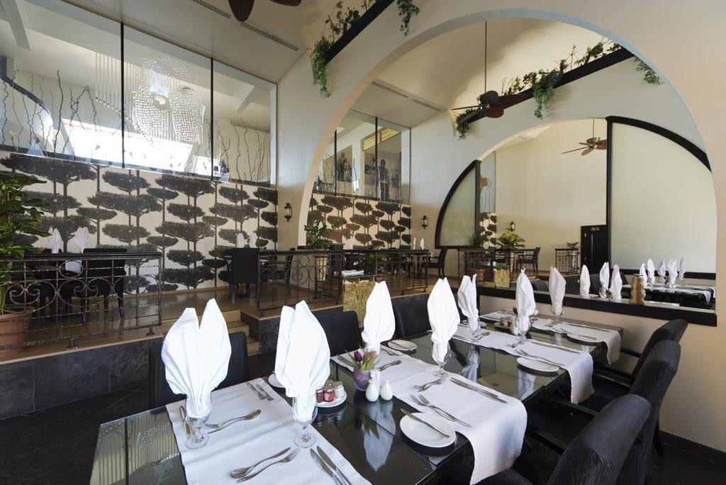 Фото Golden Tulip Al Jazira Hotel & Resort 4*