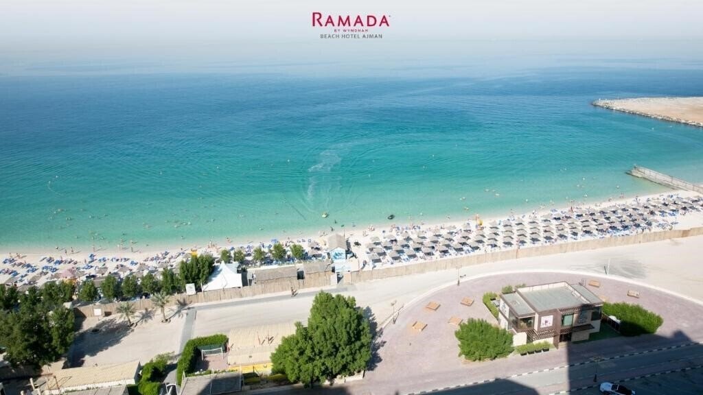 Отель Ramada by Wyndham Beach Hotel Ajman (ex. Landmark Suites Ajman, Ramada Beach Ajman, Coral Suites Ajman) 4*