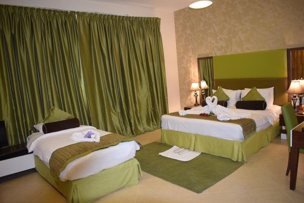 Изображение Al Waleed Holiday Homes - Al Barsha (ex. Al Waleed Palace Hotel Apartments ) 4*