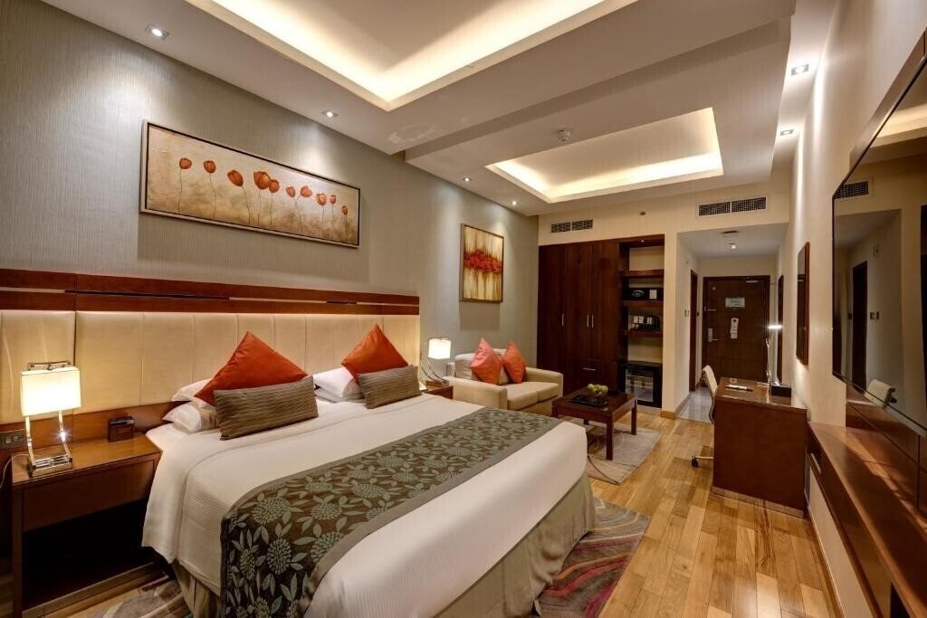 Фото Rose Park Hotel Al Barsha 4*