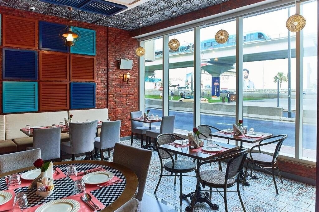 Изображение Rose Park Hotel Al Barsha 4*