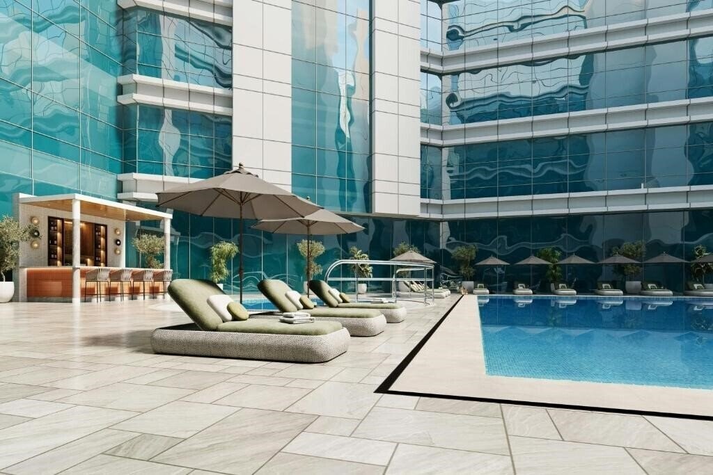 Отель Marriott Hotel Production City, Dubai 5*