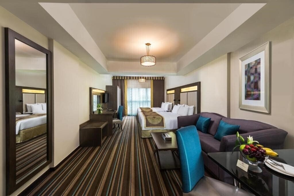 Отель Savoy Central Hotel Apartments 4*