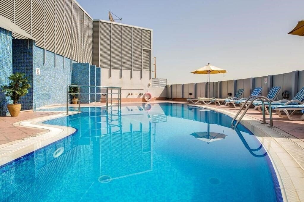 Отель Park Inn By Radisson Hotel Apartments Al Riggga апартаменты