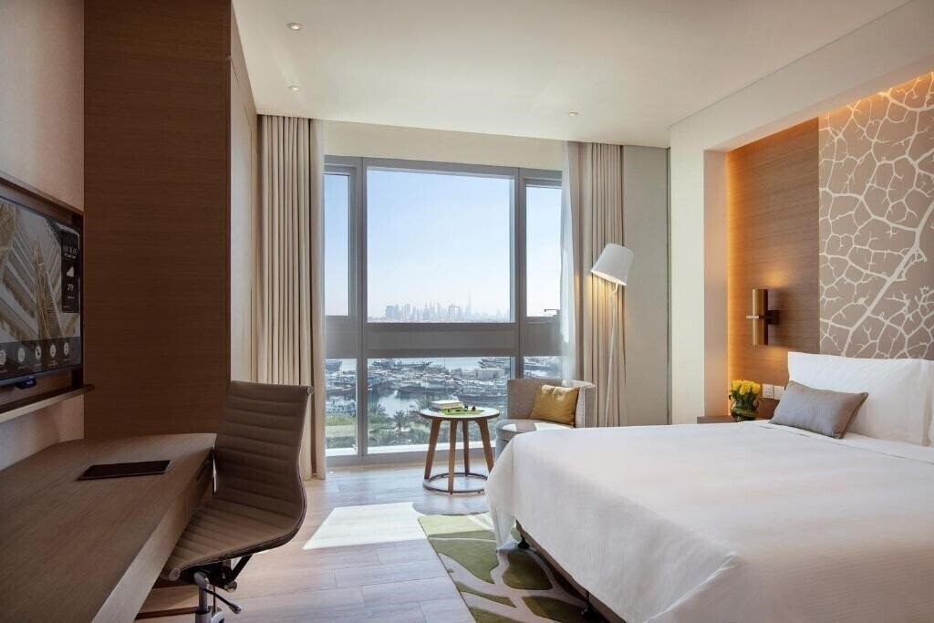 Отель Al Bandar Arjaan Dubai Creek 4*