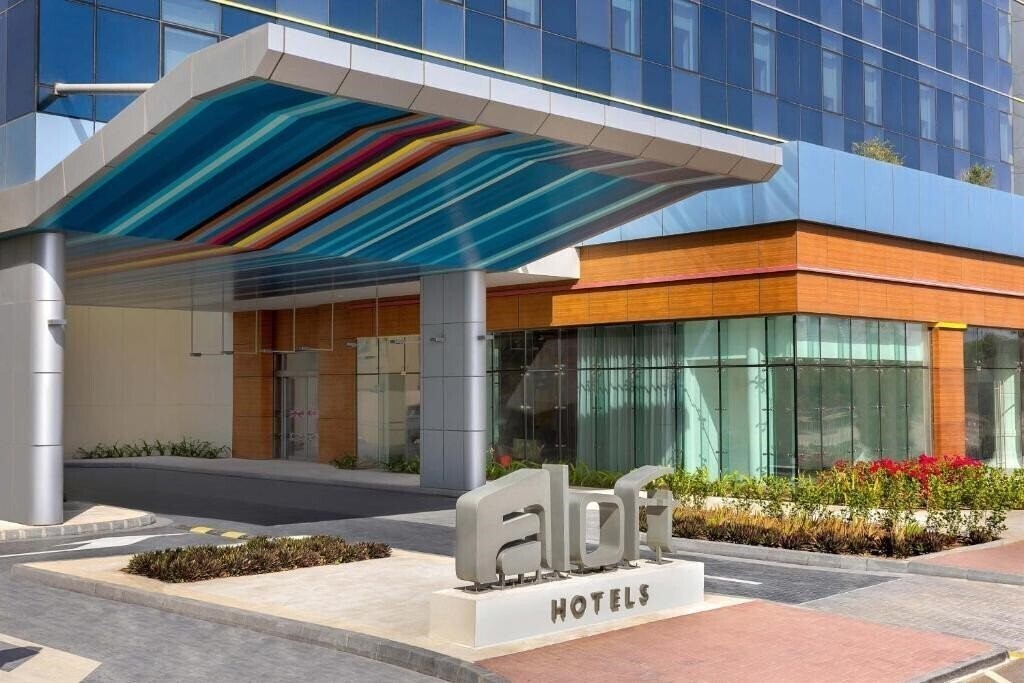 Отель Aloft Al Mina Hotel 4*