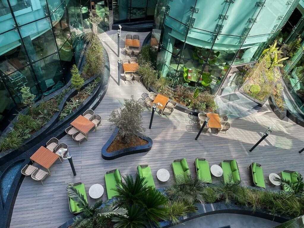Отель Al Khoory Sky Garden Hotel 4*
