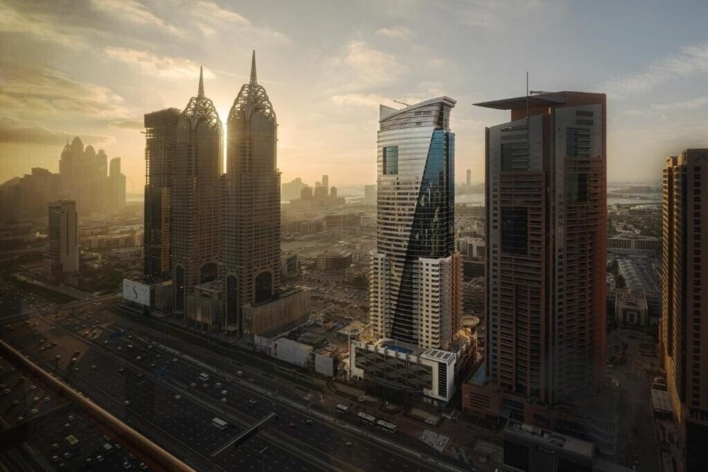 Фото Staybridge Suites Dubai Internet City (ex. Al Salam Grand Hotel Apartment, Grand Midwest Tower) 4*