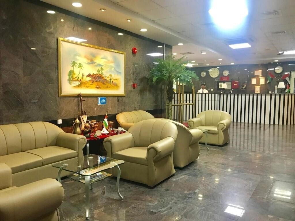 Отель Sky Hotel Apartments 3*