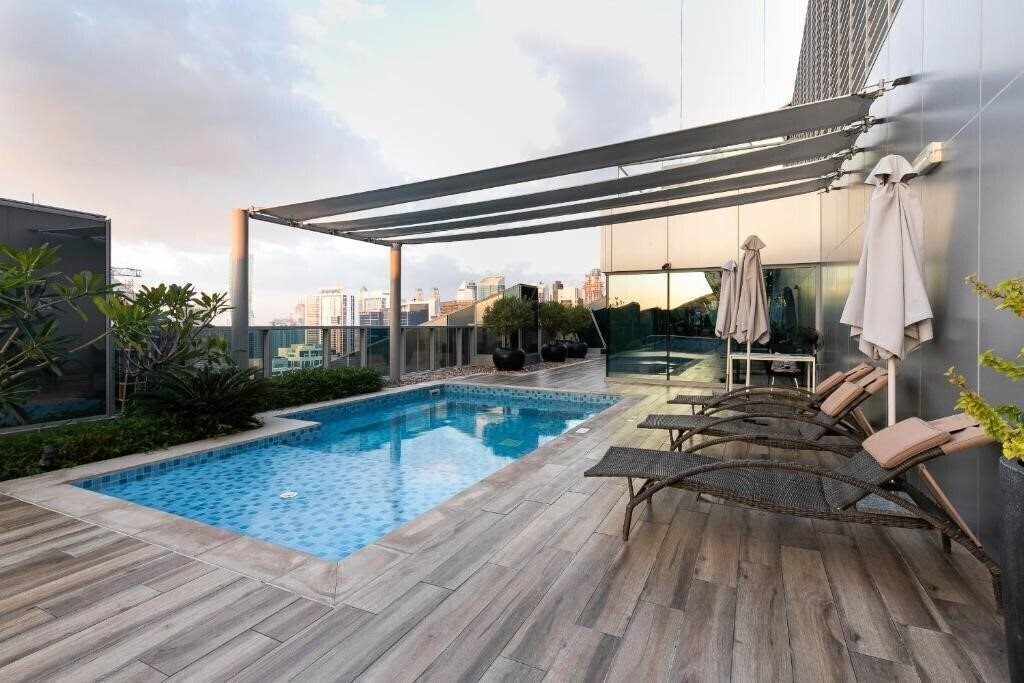 Фотография Simply Comfort Suites in J One Tower 4*