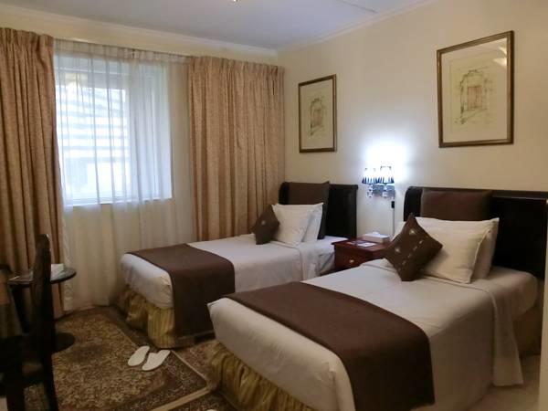 Отель Al Muraqabat Plaza Apartments 3*