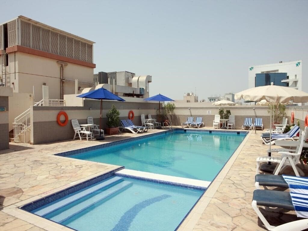 Фотография Rose Garden Hotel Apartments 3*