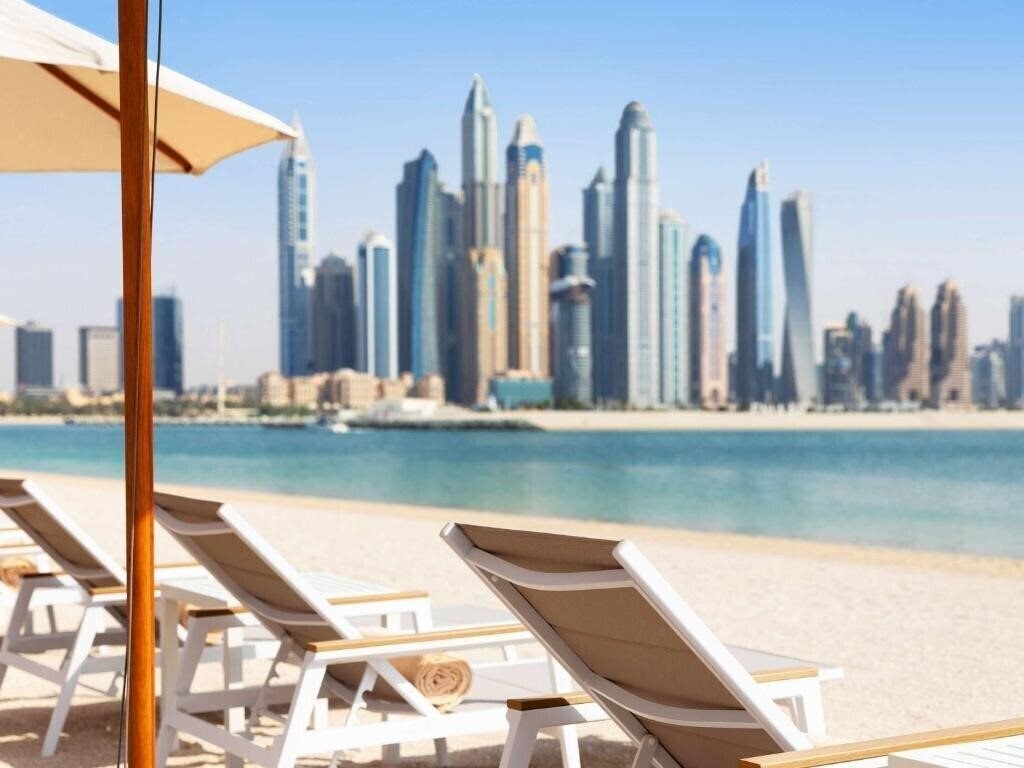 Отель Adagio Premium The Palm 4*