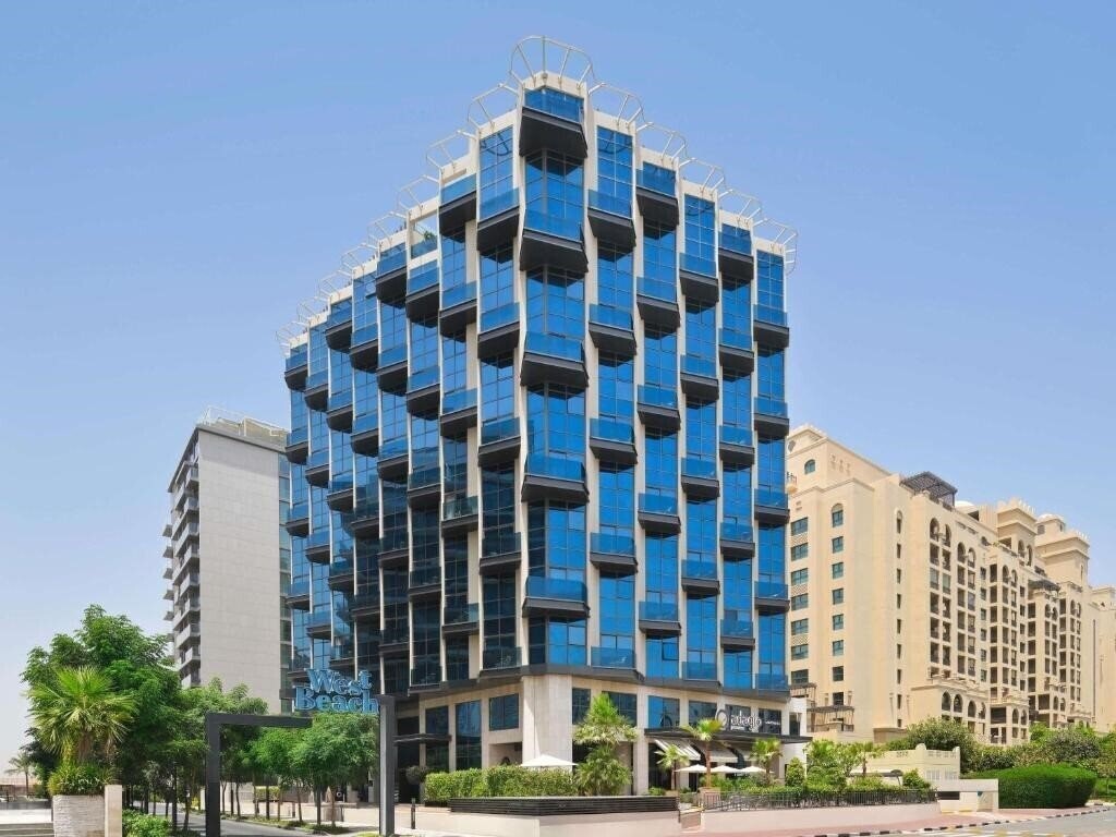 Отель Adagio Premium The Palm 4*