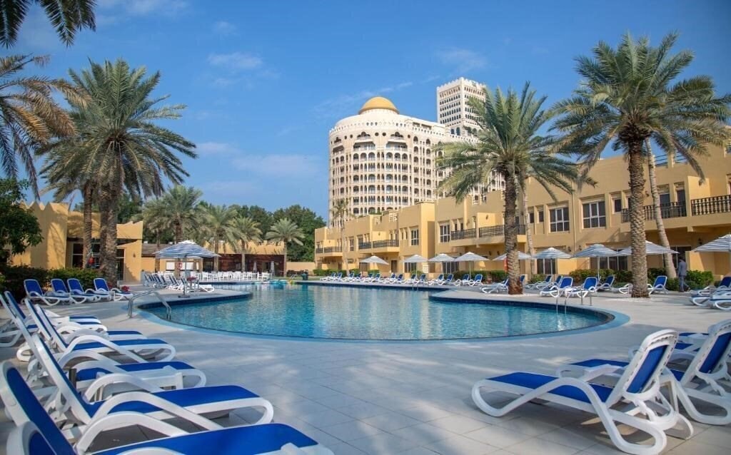 Отель Al Hamra Village Golf & Beach Resort 4*