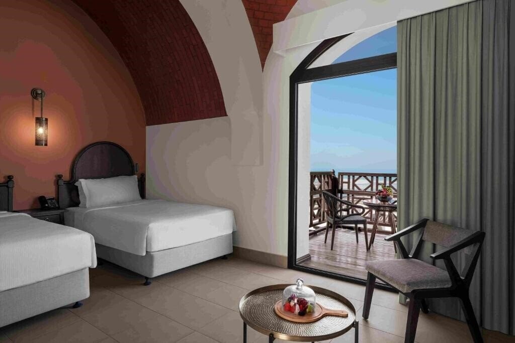Изображение The Cove Rotana Resort Ras Al Khaimah 5*