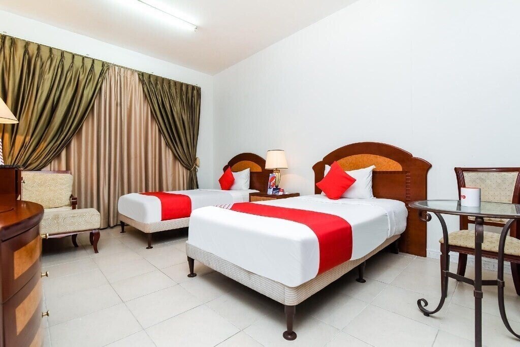 Фото OYO 247 Host Palace Hotel Apartment 2*