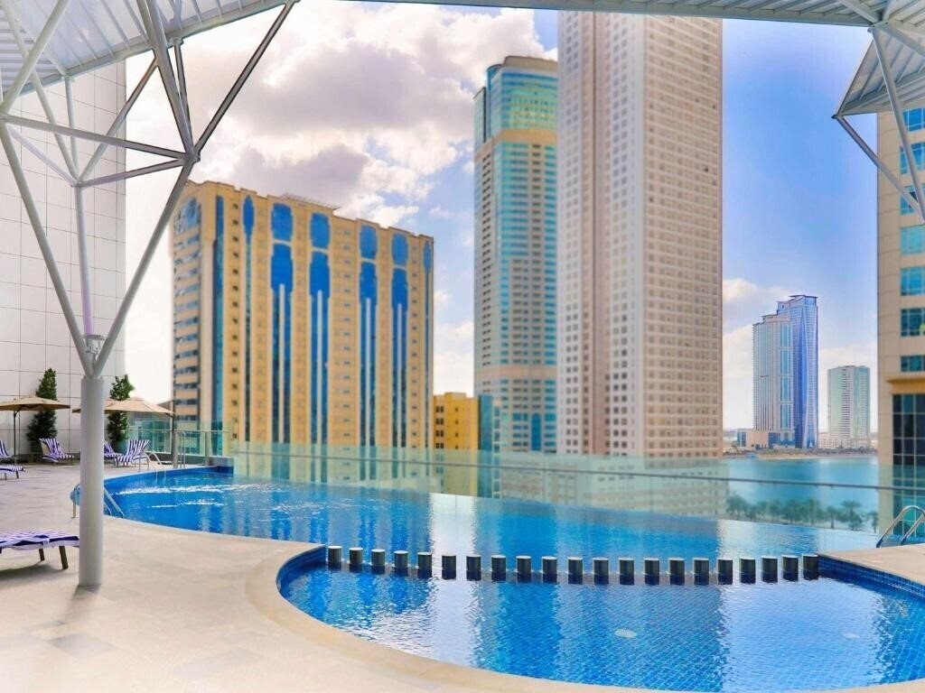 Отель Pullman Sharjah Hotel 5*