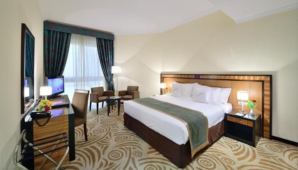 Отель Al Majaz Hotel Apartments 3*