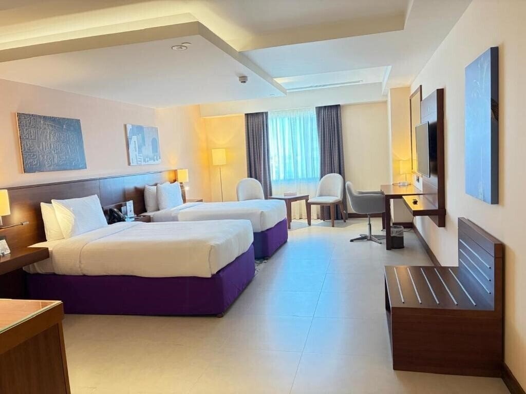 Отель Kyriad Hotel 3*