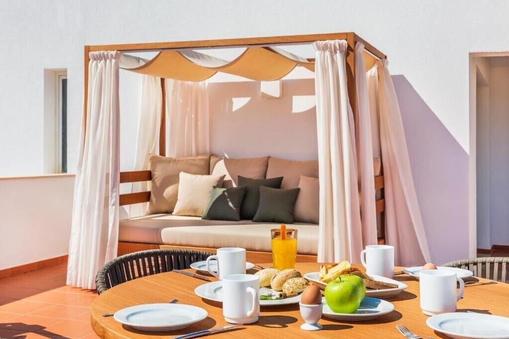 Изображение The Patio Suite Hotel 4*