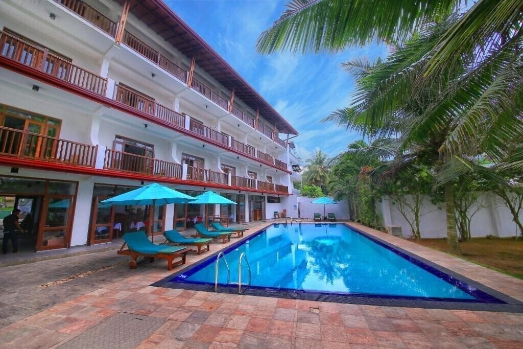 Отель Rock Side Beach Resort 3*