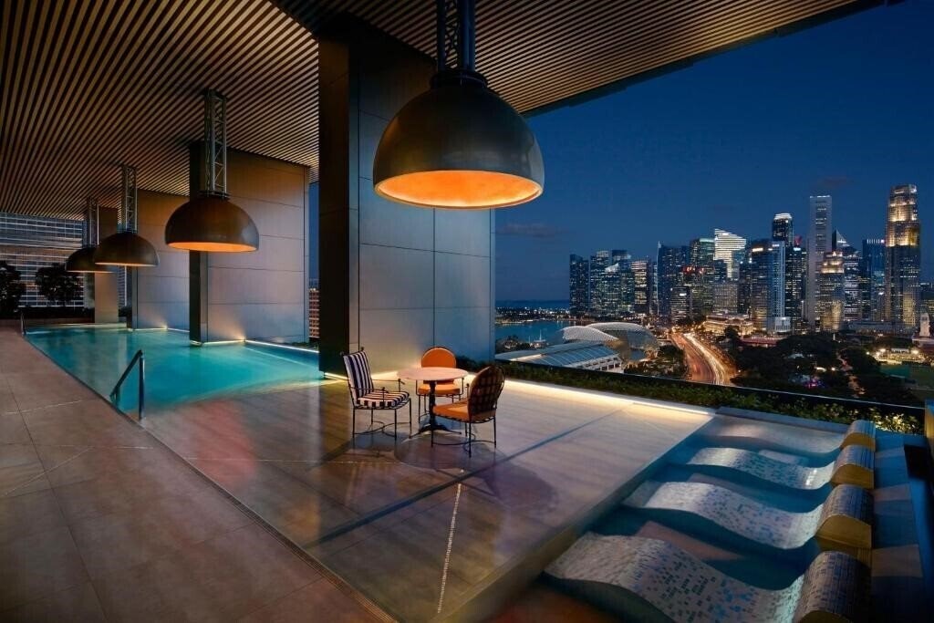 Отель Jw Marriott Singapore South Beach 5*