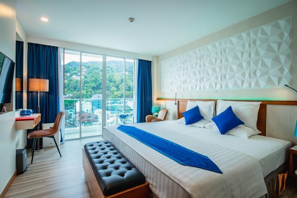 Фото The Sira Grande Patong 4*