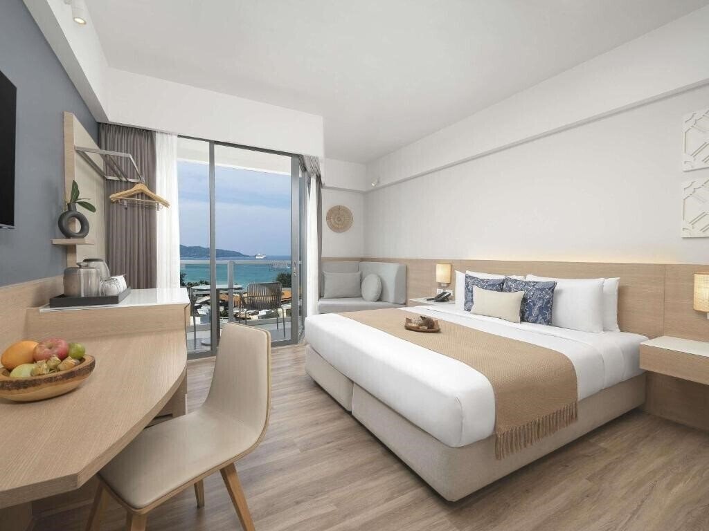 Фото The Andaman Beach Hotel Phuket 4*