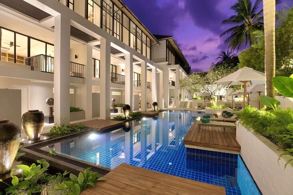 Фото Outrigger Surin Beach Resort 4*