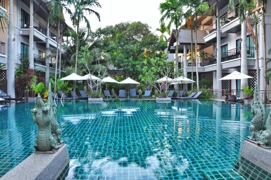 Отель Navatara Phuket Resort 4*