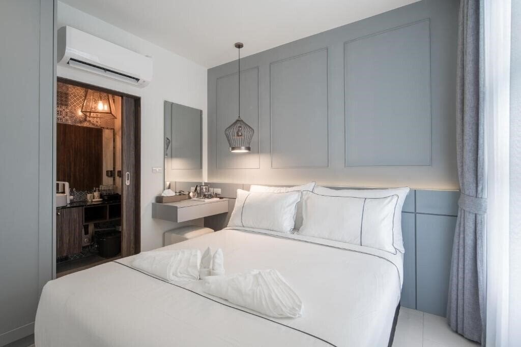 Отель Palmyrah Surin Beach 3*