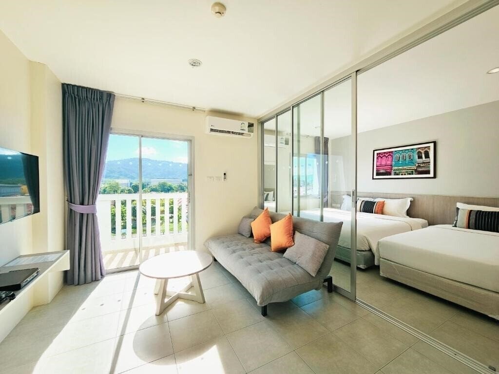 Фото Recenta Suite Phuket Suanluang 4*