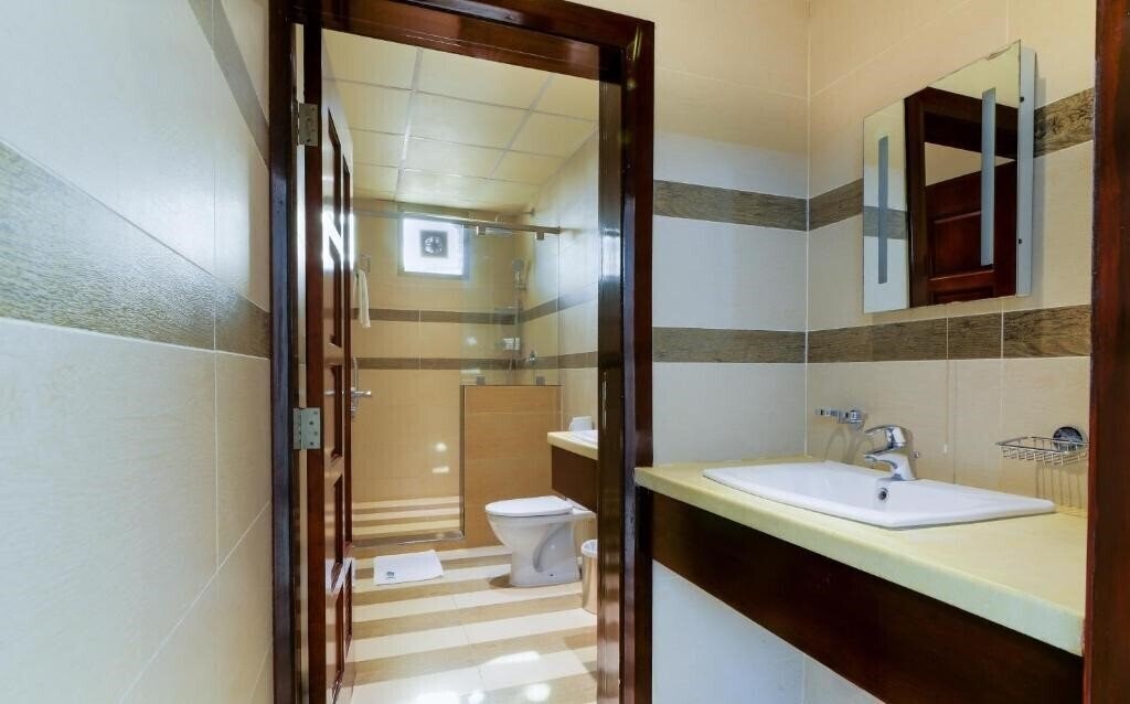 Фото Tanzanite Executive Suites 3*