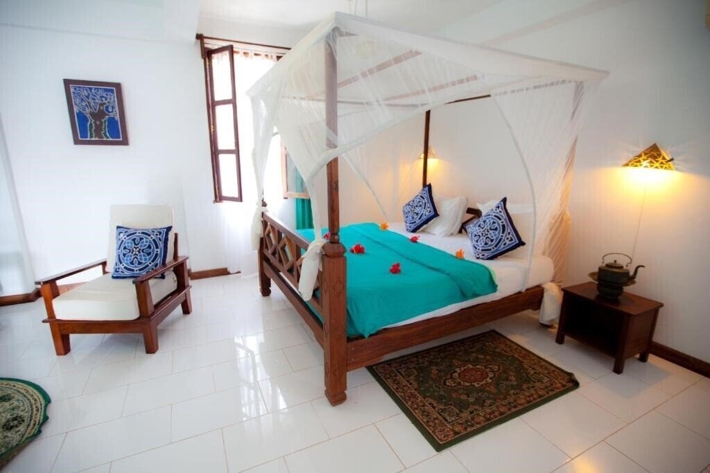 Отель Flame Tree Cottages 3*