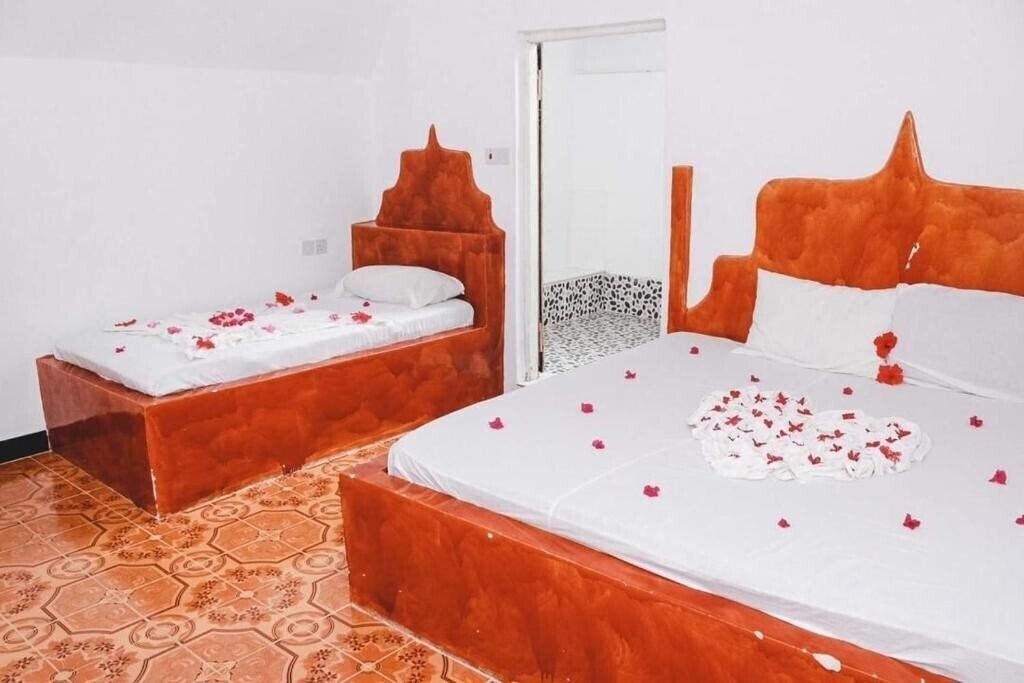 Фото Jambo Beach Bungalows 3*