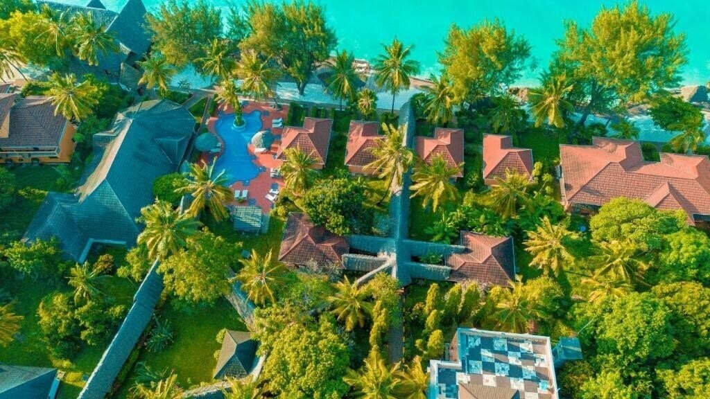 Отель Mnarani Beach Cottages 4*