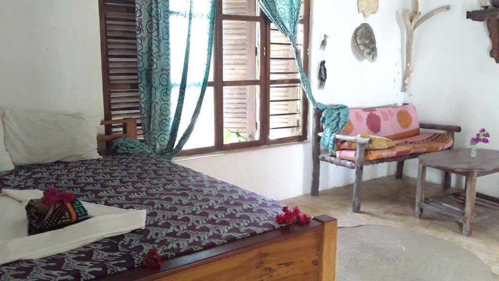 Фотография Mango Beach House 3*