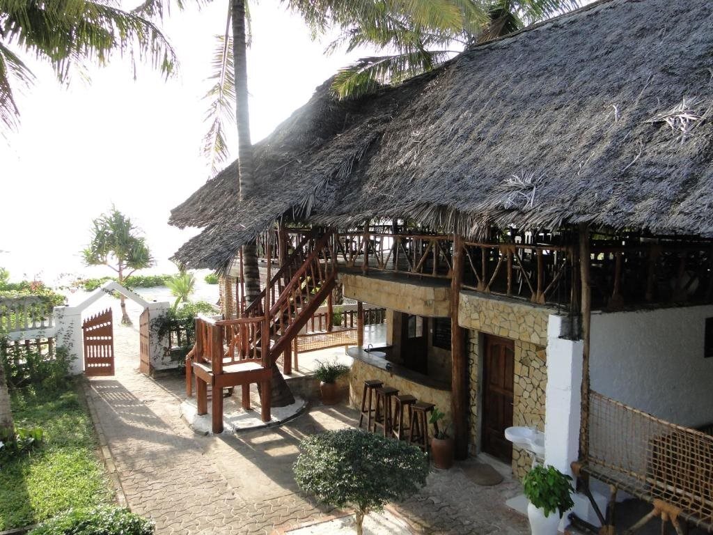 Фото Pwani Silver sand Beach Hotel 4*