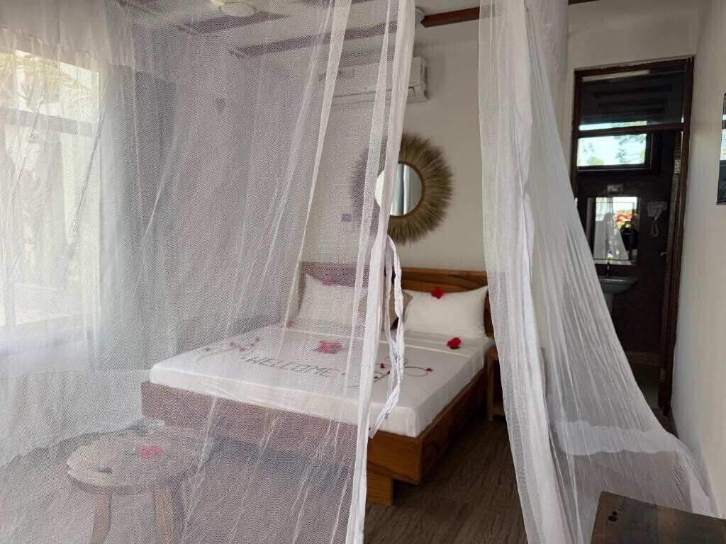 Фото Boutique View Garden Kendwa 3*