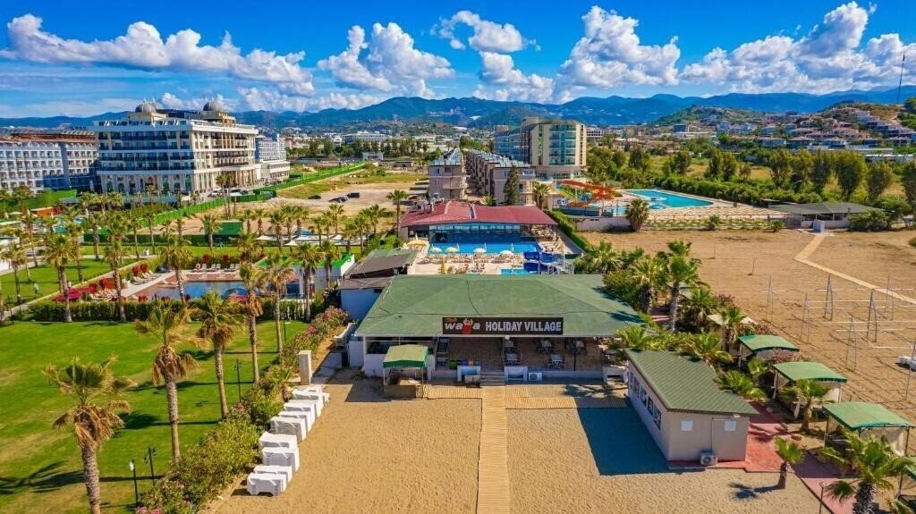 Фото Club Wasa Holiday Village (ex. Larissa Holiday Beach Club, Coralis Sun Queen Beach Hotel, Aska Sun Queen Beach Hotel, Sun Queen Beach) 4*