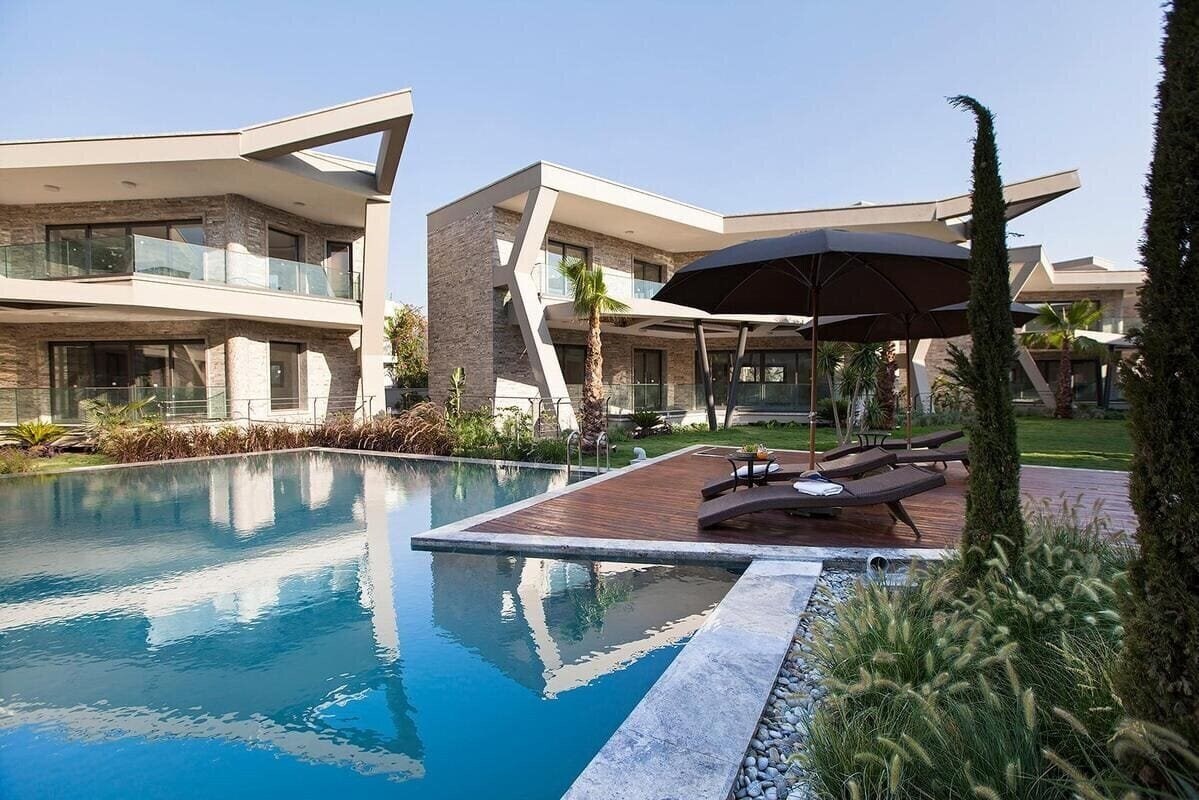 Фотография Retron Residence (ex. Costa Carina Hotel, Costa Blue Resort, Hira Beach Hotel, Woxxie Gumbet) 4*