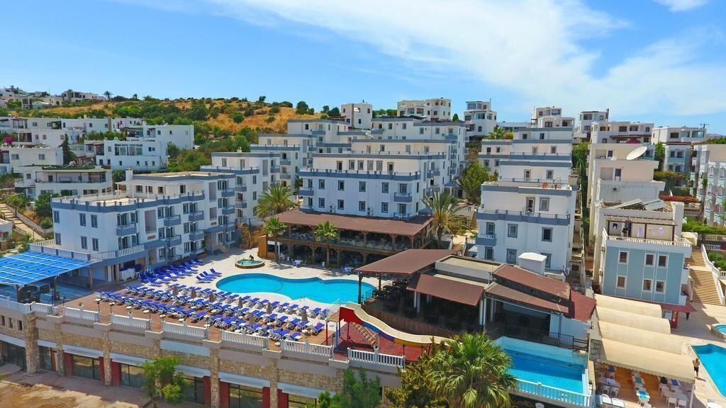 Отель Smart Holiday Hotel Bodrum (ex. Bella Casa Hotel, Bellacasa Suites & Club, Costa Akkan Suites, Aura Hotel Bodrum) 4*