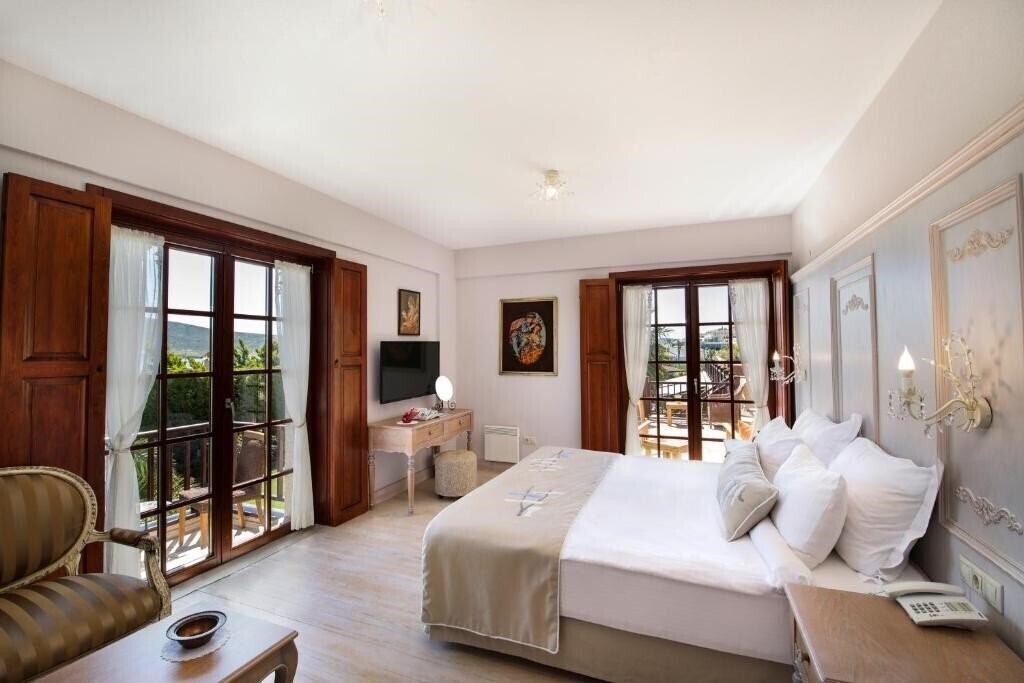 Фото Alacati Kapari Hotel 4*
