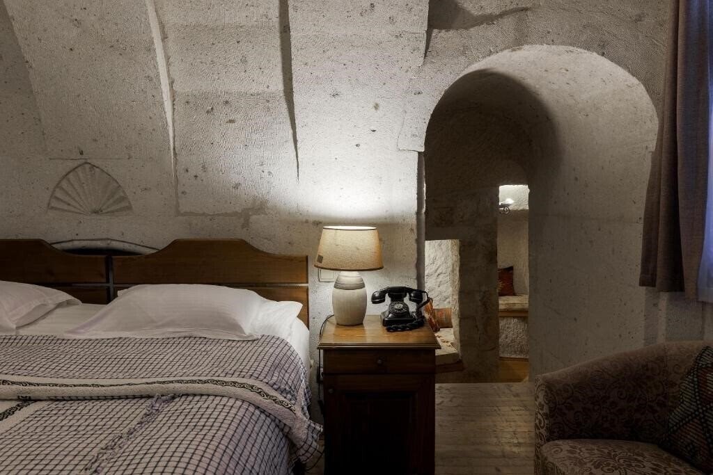 Отель Cappadocia Cave Suites 4*