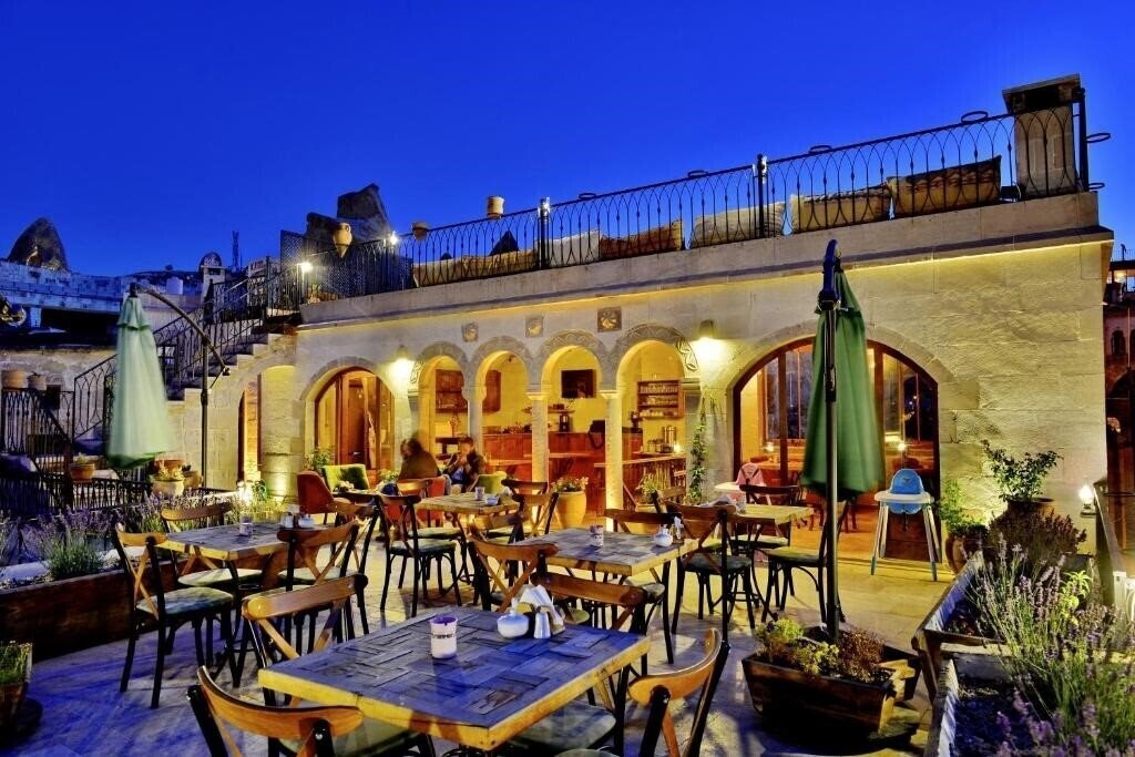 Фото Caftan Cave Suites 4*